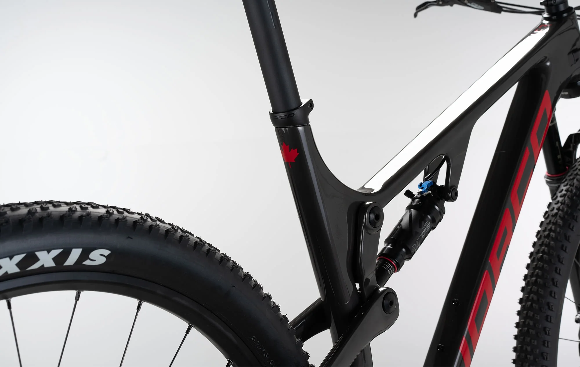 Bicicleta Revolver FS 2 100 XC Race Aro 29" Negro/Rojo Norco - Image 3